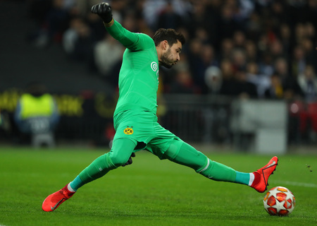 LONDON, ENGLAND - FEBRUARY 13 2019: Roman Burki of Dortmund makes a save during the Champions League match between Tottenham Hotspur and Borussia Dortmund at Wembley Stadium, London.のeditorial素材