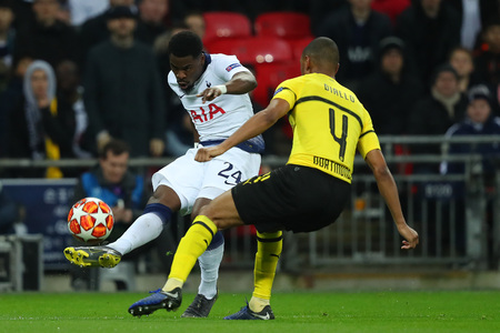 LONDON, ENGLAND - FEBRUARY 13 2019: Serge Aurier of Tottenham and Abdou Diallo of Dortmund during the Champions League match between Tottenham Hotspur and Borussia Dortmund at Wembley Stadium, London.のeditorial素材