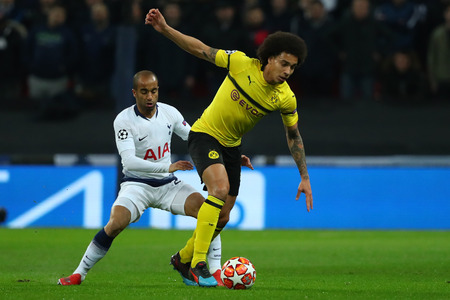 LONDON, ENGLAND - FEBRUARY 13 2019: Lucas of Tottenham and Axel Witsel of Dortmund during the Champions League match between Tottenham Hotspur and Borussia Dortmund at Wembley Stadium, London.のeditorial素材