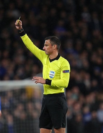 LONDON, ENGLAND - MARCH 7 2019: Referee Slavko Vicic  during the Europa League match between Chelsea and Dynamo Kyiv at Stamford Bridge.のeditorial素材