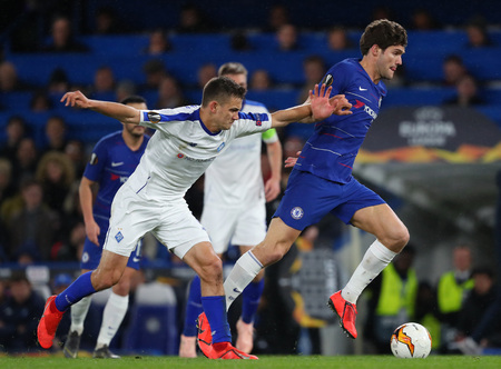 LONDON, ENGLAND - MARCH 7 2019: Volodymyr Shepelyev of Dynamo Kiev and Marcos Alonso of Chelsea during the Europa League match between Chelsea and Dynamo Kyiv at Stamford Bridge.のeditorial素材