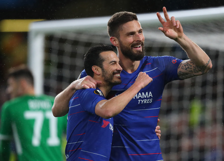 LONDON, ENGLAND - MARCH 7 2019: Pedro of Chelsea celebrates scoring a goal with Olivier Giroud during the Europa League match between Chelsea and Dynamo Kyiv at Stamford Bridge.のeditorial素材