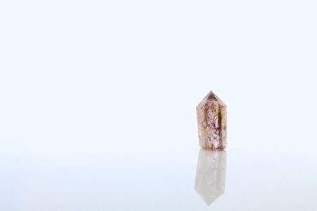 Purple Amethyst Stone Isolated on White Backdrop