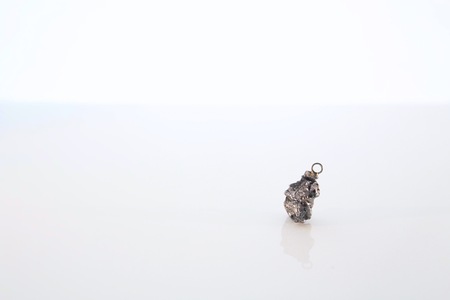 Natural Silver Rock Necklace Pendant Isolated on White Backgroundの写真素材