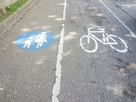 Signs for pedestrians and cyclists on the streetの写真素材