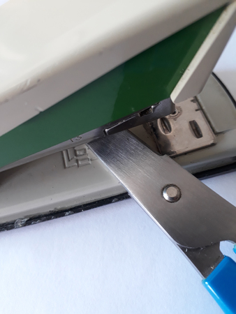 Tacker with scissors in the officeの写真素材