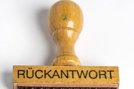 A rubber stamp with copy space isolated on whiteの写真素材