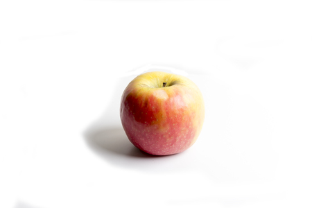 a simple apple on white backgroundの写真素材