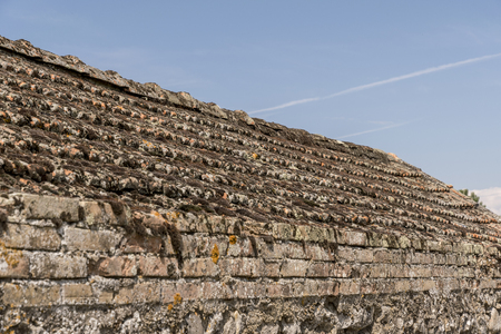 old stone roof as a backgroundの写真素材