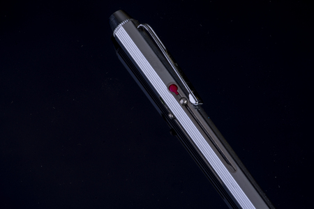 Ballpoint pen with colour changer set to red retroの写真素材