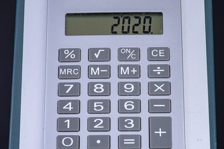 Pocket calculator with the year 2020 on the display Turn of the yearの写真素材