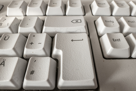 very dirty keyboard with the focus on the letters