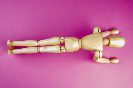 wooden man making plank sportの写真素材