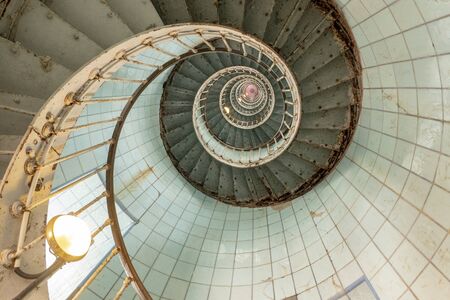 Staircase in a lighthouse super steep and spiral upwardsの写真素材
