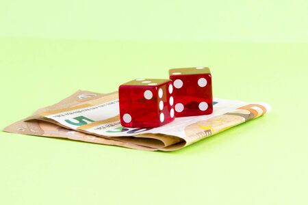 red cubes with Euro banknotesの写真素材