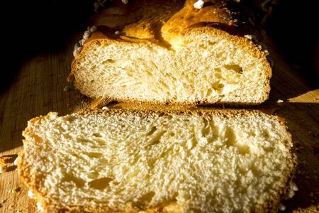 golden yellow yeast plait with crystal sugarの写真素材