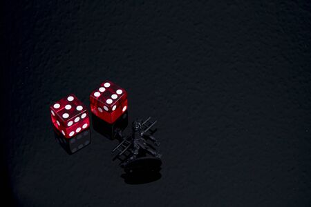 Gambling with dice and lucky charmsの写真素材
