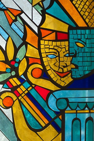 The fragment of coloured stained glass windowの写真素材