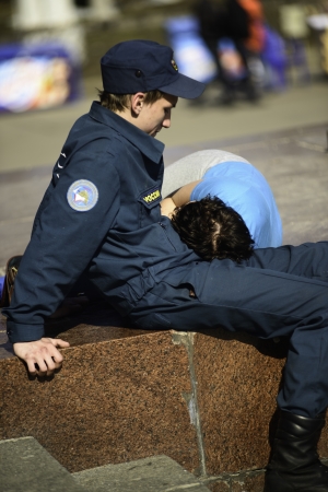 MOSCOW - APRIL 16: A military student having good time with his girlfriend at All-Russia Exhibition Center April 16, 2013 in Moscow, Russiaのeditorial素材