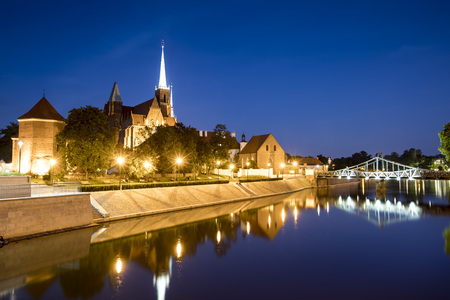 Evening photo of illuminated St. John the Baptist Cathedral in Wroclaw, Polandの写真素材