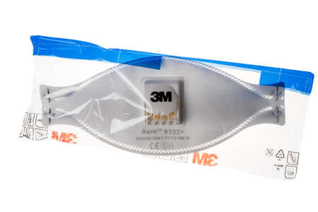 VARNA, BULGARIA - MARCH 15, 2020:Photo of a 3M mask in its package isolated on white. 3M is a company producing safety equipment.のeditorial素材