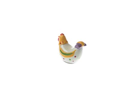 Ceramic colorful chicken for easter decoration, isolated on whiteの写真素材