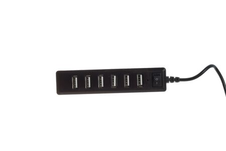 Black USB hub with six ports, isolated on whiteの写真素材