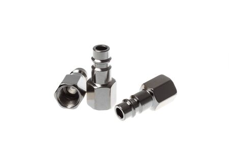 Set of stainlees steel male couplings with female thread, isolated on white background.の写真素材