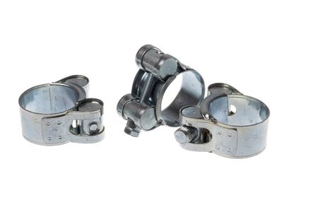 Set of steel hex screw adjustable hose clamps, isolated on white backgroundの写真素材