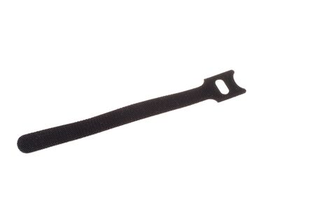 Black fabric cable tie, isolated on white backgroundの写真素材