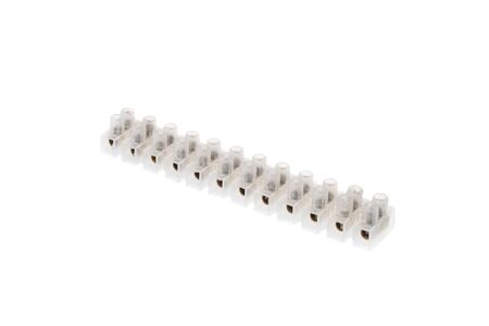 Transparent plastic electrical terminal block, isolated on white backgroundの写真素材