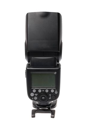 DSLR camera speedlite flash with its display on its stand, isolated on white backgroundの写真素材
