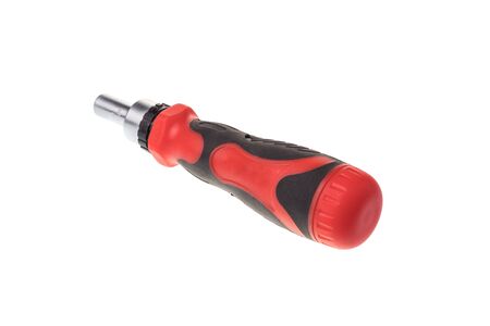 Screwdriver ratchet with plastic handle with hollow space for bits, isolated on white backgroundの写真素材