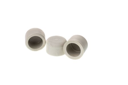 Set of plastic PPR female cap end fitting for water pipes, isolated on white backgroundの写真素材