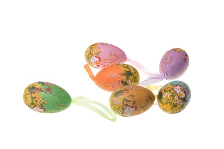 Colorful painted easter eggs for decorative purposes, isolated on whiteの写真素材