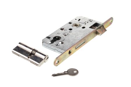 Door lock element with key and key mechanism, isolated on white backgroundの写真素材