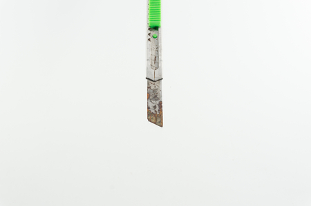 Knife Cutter rust on a white background.の写真素材