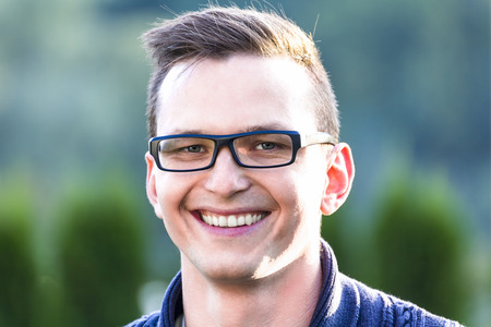 Handsome young man outdoorsの写真素材