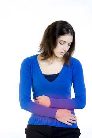 Woman having a Stomachacheの写真素材