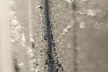 Water on black metal abstract