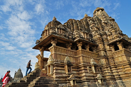 visitors at Vishvanatha Temple, dedicated to Lord Shiva, Western Temples of Khajuraho, Khajuraho, Madhya Pradesh, Indiaのeditorial素材