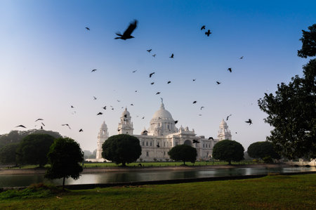 Flying birds and Victoria Memorial, Kolkata , India  A Historical Monument of Indian Architecture  It was built between 1906 and 1921 to commemorate Queen Victoriaのeditorial素材