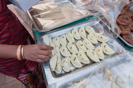 KOLKATA, WEST BENGAL , INDIA - JANUARY 12TH 2014   Sweets, Indian food , Artworks of handicraft, on display during the Handicraft Fair in Kolkata - the biggest handicrafts fair in Asia の写真素材