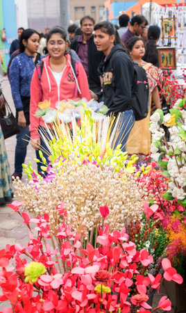 KOLKATA, WEST BENGAL , INDIA - DECEMBER 12TH 2014 : spongewood made artificial colored flowers, handicrafts on display in Handicraft Fair in Kolkata - the biggest handicrafts fair in Asia.のeditorial素材