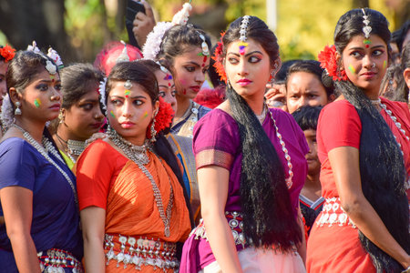 KOLKATA , INDIA - MARCH 5, 2015 : Young girl dancers waiting to perform at Holi  Spring festival, known as Dol in Bengali or Holi in Hindi celebrating arrival of Spring in India. A very popular festival amongst Bengalis.のeditorial素材