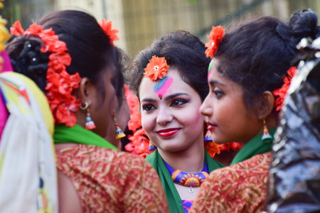 KOLKATA , INDIA - MARCH 5, 2015 : Young girl dancer's joyful expression at Holi  Spring festival, known as Dol in Bengali or Holi in Hindi celebrating arrival of Spring in India. A very popular festival amongst Bengalis.のeditorial素材