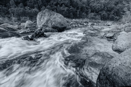 Beautiful Reshi River water flowing on rocks at dawn, Sikkim, India - a spectacular view , tinted imageの写真素材