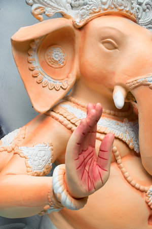 KOLKATA, WEST BENGAL, INDIA - 13 SEPTEMBER 2015: Beautiful fresh painted clay idol of Lord Ganesha , at Kumartuli, as preparation for "Durga Puja' festival in Kumartuli, Kolkata, capital of West Bengal, India. It is the biggest festival of Hinduism.のeditorial素材