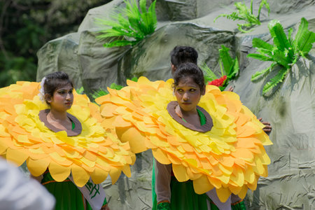 KOLKATA, WEST BENGAL / INDIA - AUGUST 15TH, 2016 : Female folk dancers in colorful make up in India's Independence day rally. The day in celebrtated all over India with joy.のeditorial素材