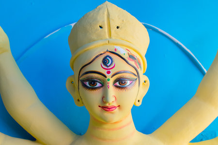KOLKATA, WEST BENGAL, INDIA - 25 SEPTEMBER 2016: Clay idol of Goddess Durga's face, under preparation for "Durga Puja' festival in Kumartuli, Kolkata. Biggest festival of Hinduism.のeditorial素材